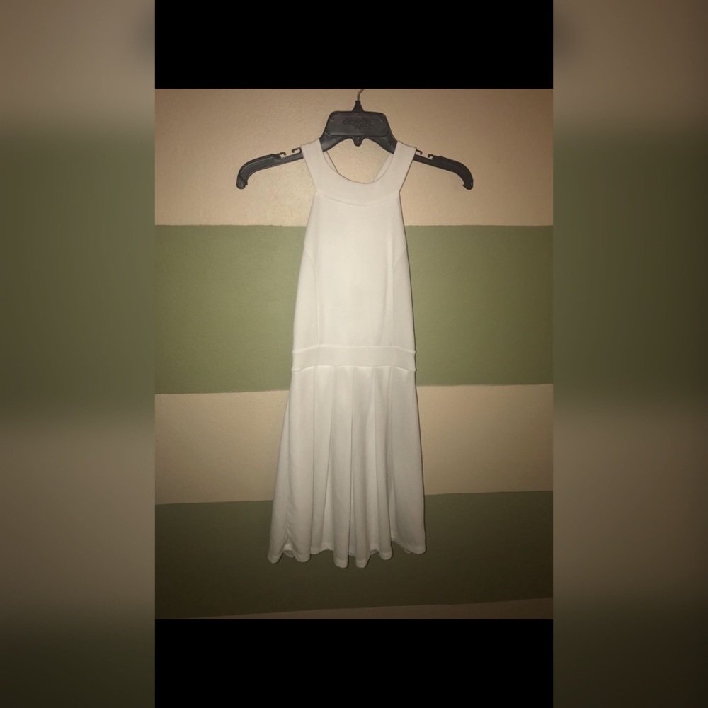 Francesca’s white dress with bow